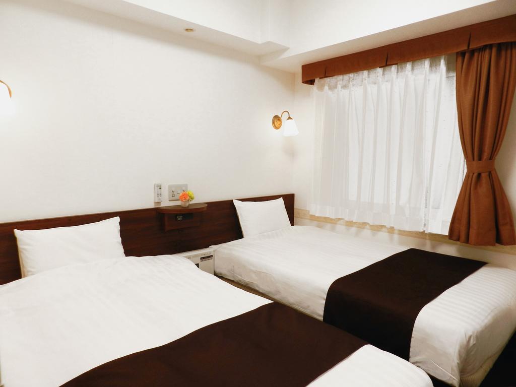 Hotel Check In Shimbashi Tóquio Quarto foto